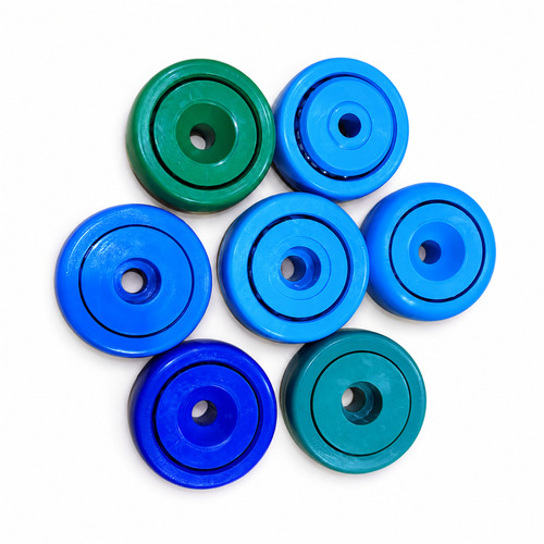 Plastic ball bearing wheel for poultry processing overhead conveyor